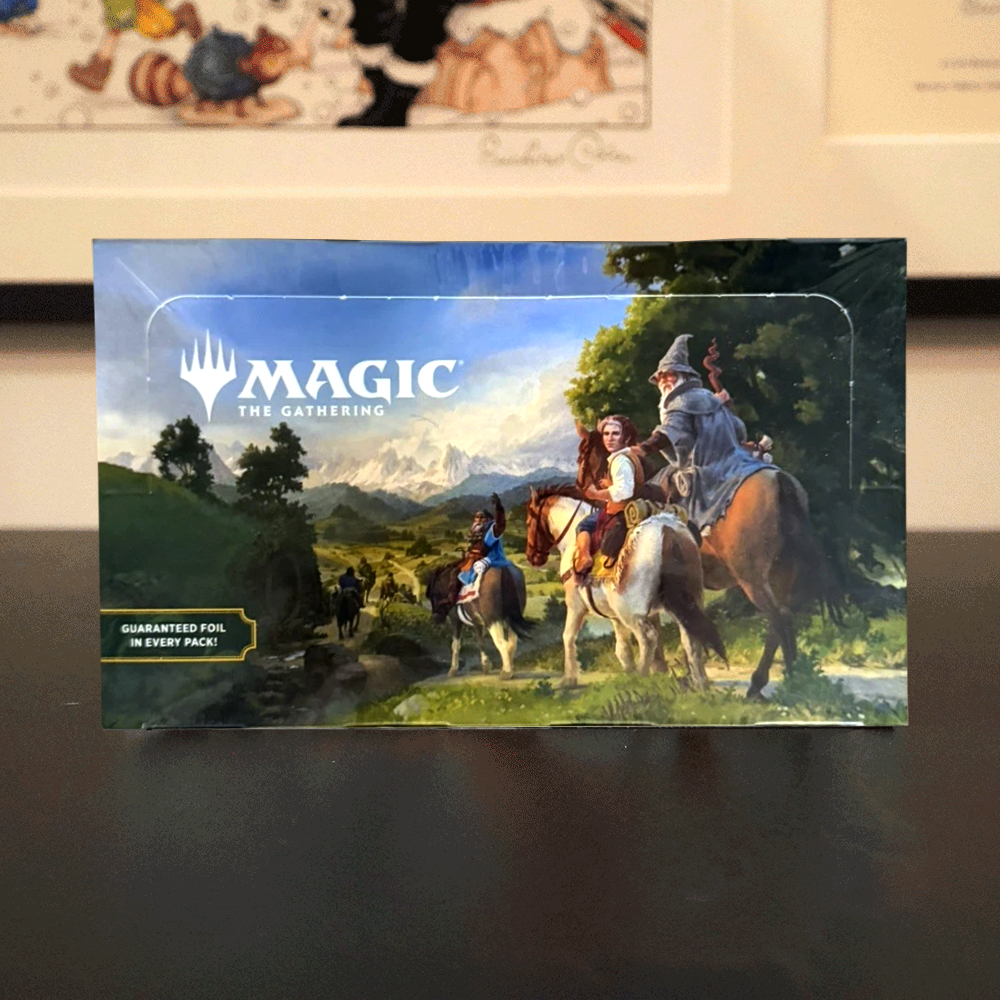 The Hobbit Play Booster Box featuring artwork of riders traveling through a scenic landscape